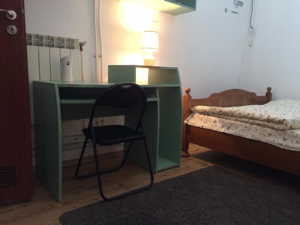 Postel nebo postele na pokoji v ubytování Studio Julius Constanta