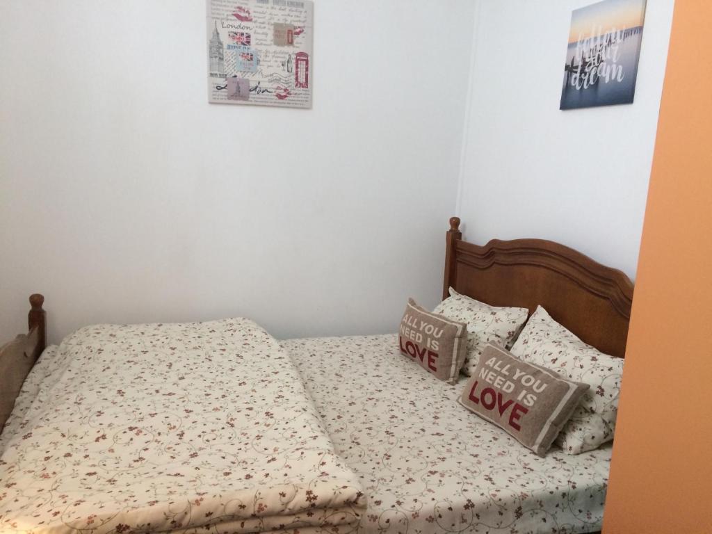 Postel nebo postele na pokoji v ubytování Studio Julius Constanta