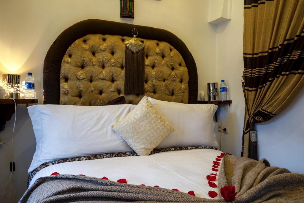 Una cama o camas en una habitación de Riad Anabel