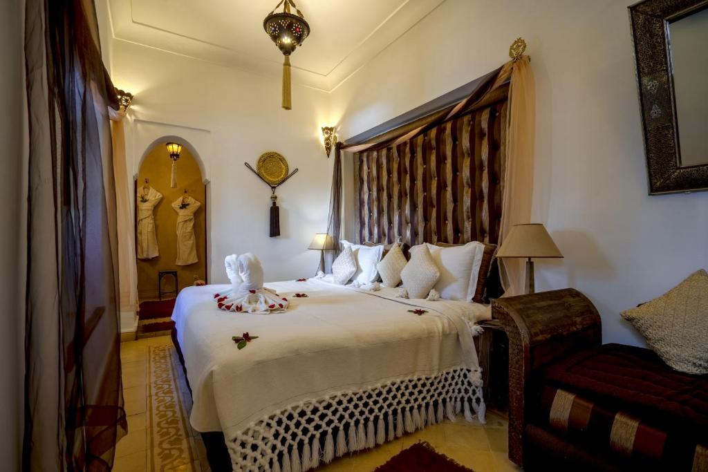 Una cama o camas en una habitación de Riad Anabel