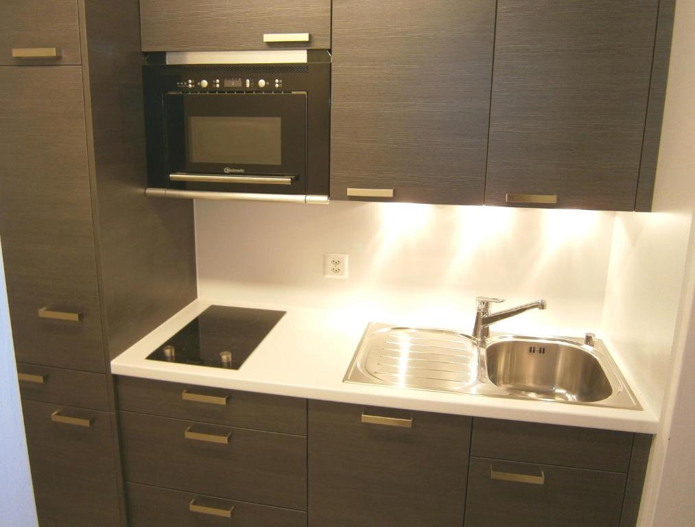 Kuchyň nebo kuchyňský kout v ubytování Apart Holidays - Haus Acletta