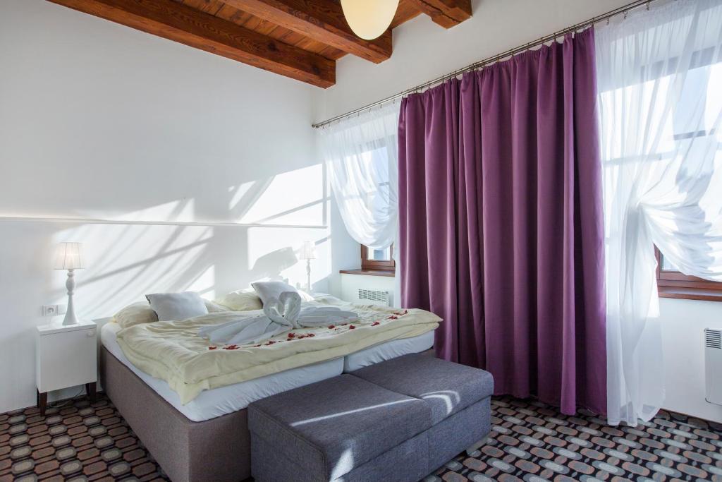 Postel nebo postele na pokoji v ubytování Hotel Salety