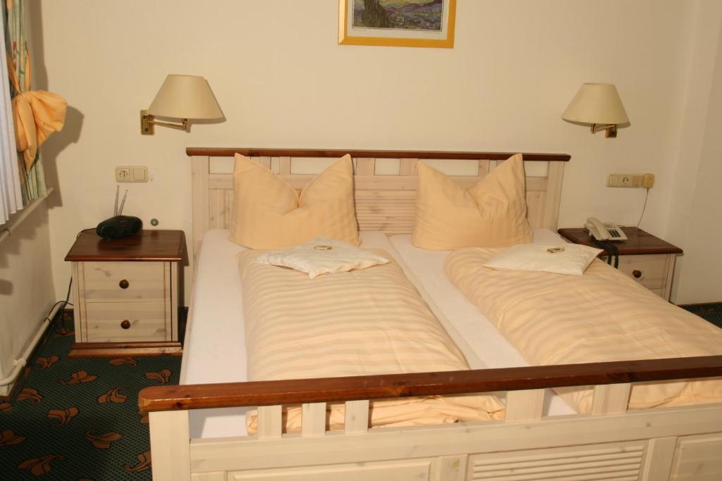 Postel nebo postele na pokoji v ubytování Hotel Irene