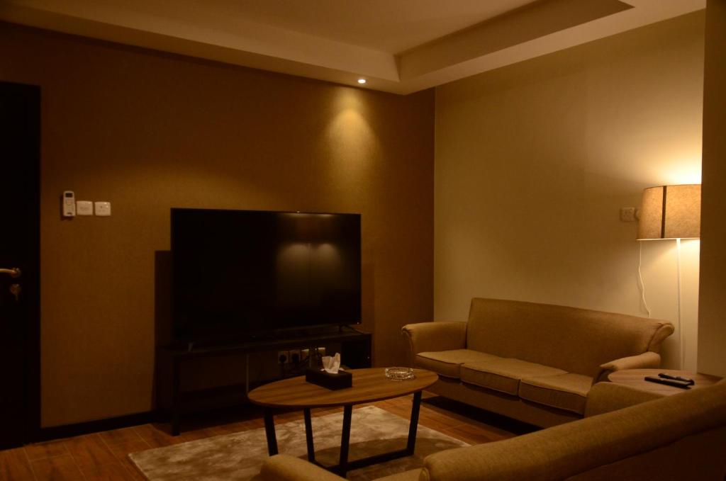 TV a/nebo společenská místnost v ubytování منازل الشمال للشقق المخدومة Manazel Al Shamal Serviced Apartments