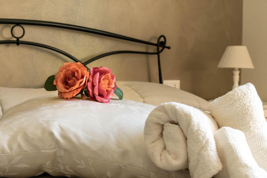 Postel nebo postele na pokoji v ubytování La Casa del Nonno