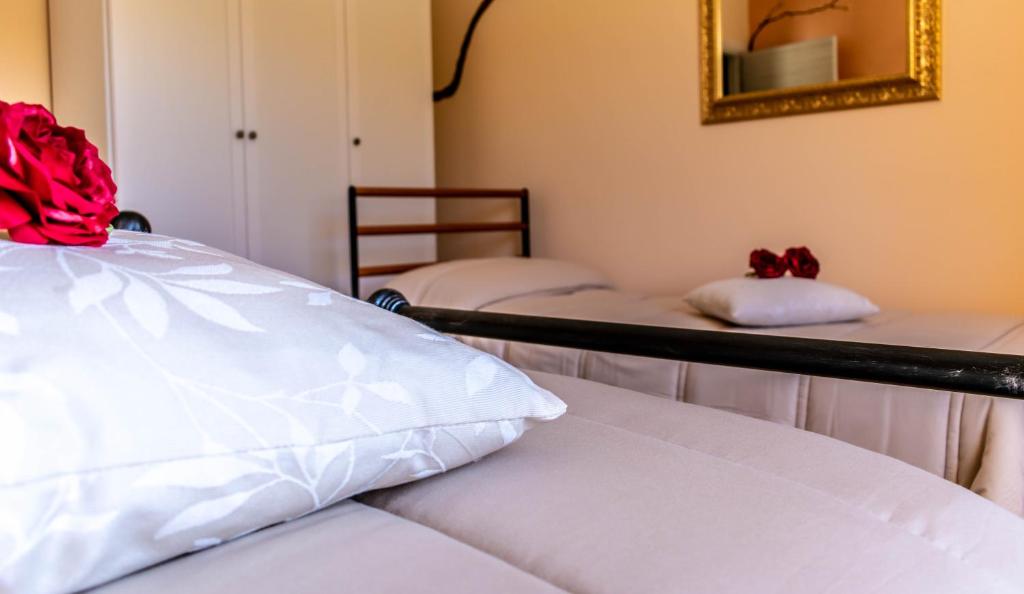 Postel nebo postele na pokoji v ubytování La Casa del Nonno