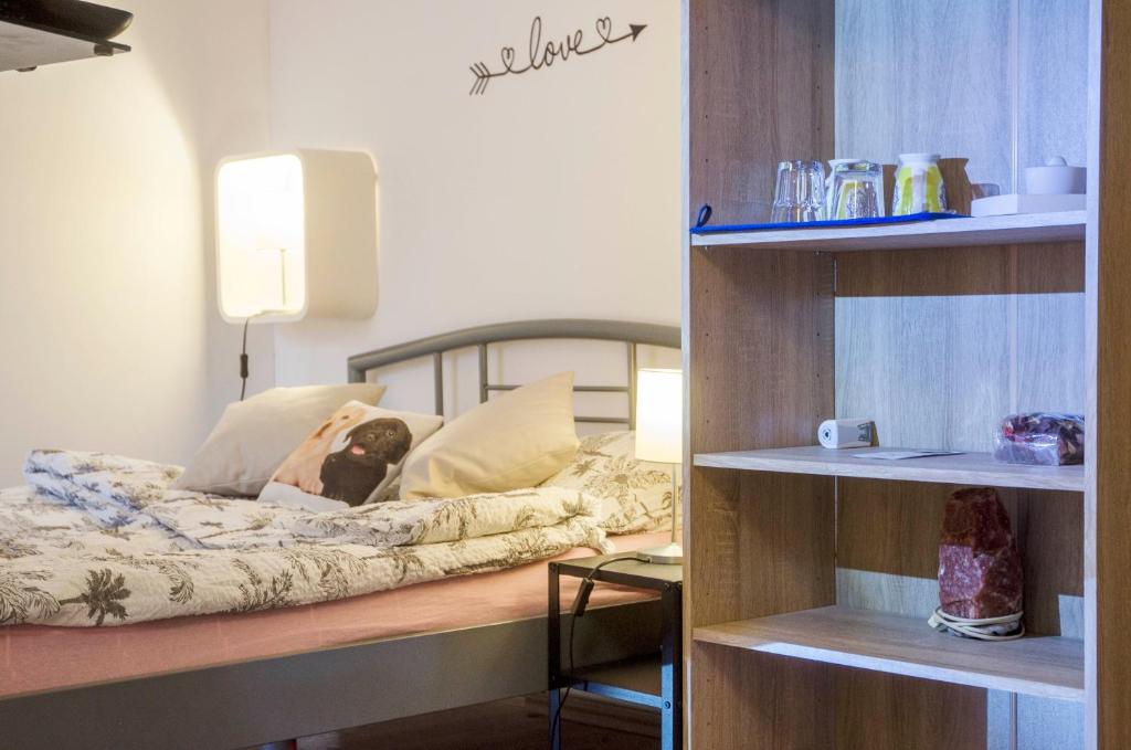 Postel nebo postele na pokoji v ubytování Rooms and Apartment Veral-KA