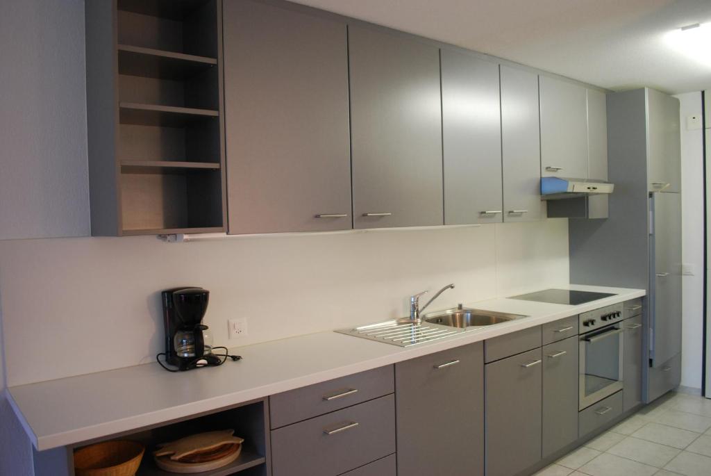 Kuchyň nebo kuchyňský kout v ubytování Apart Holidays - Haus Acletta