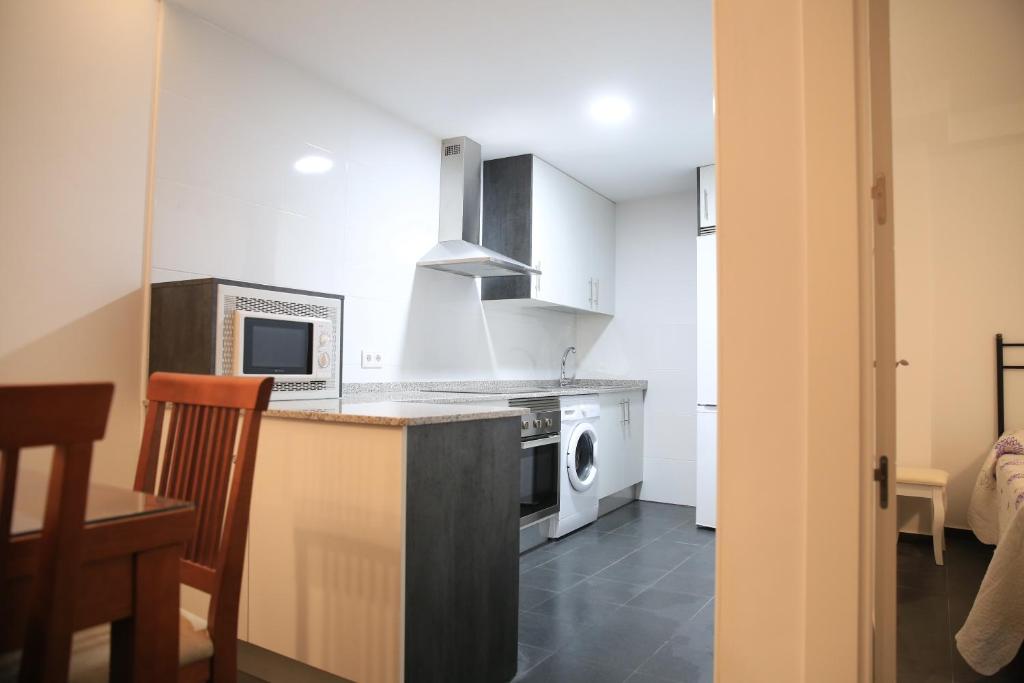 Kuchyňa alebo kuchynka v ubytovaní APARTAMENTOS LA VEREDA