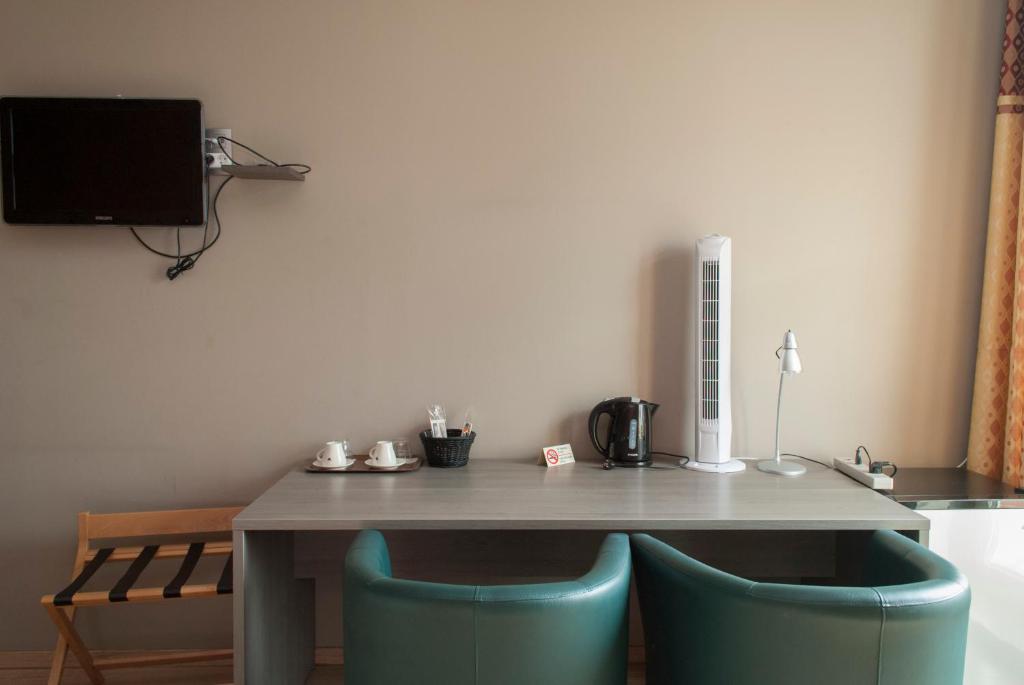 Kuchyň nebo kuchyňský kout v ubytování Hotel Castel