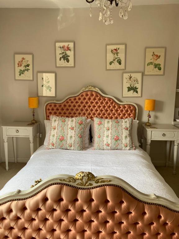 Letto o letti in una camera di Pytts House Boutique Bed & Breakfast
