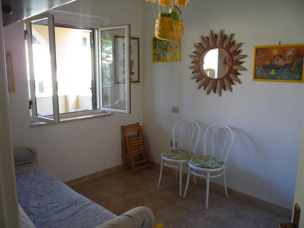 A seating area at Graziosa Casa A 2 passi dalla Spiaggia e dal Castello