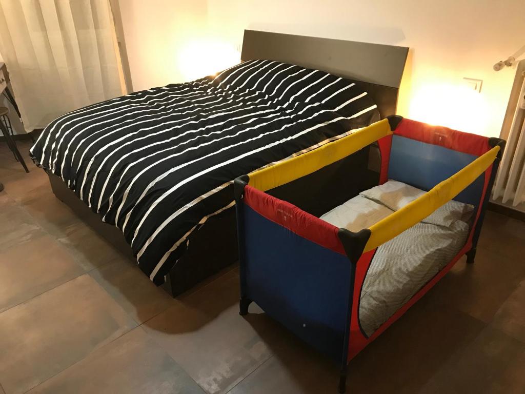 Łóżko lub łóżka w pokoju w obiekcie Appartamento in via Licia