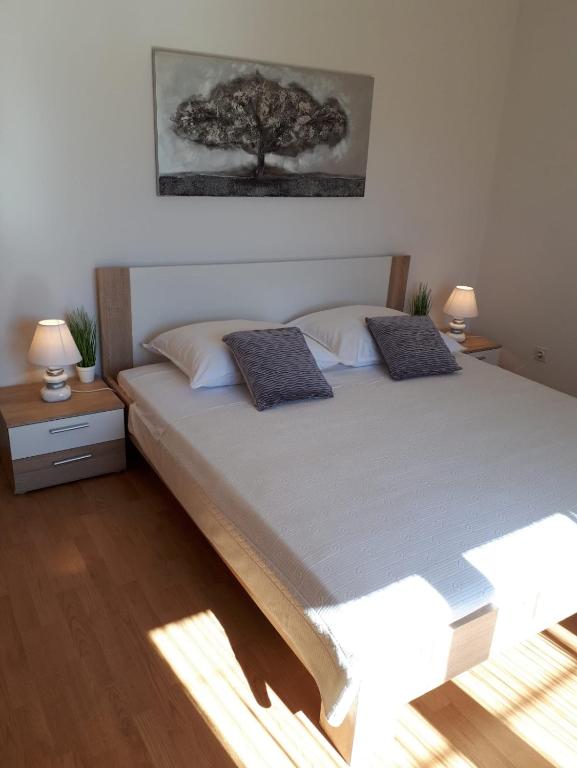 Posteľ alebo postele v izbe v ubytovaní Cozy apartment Josipa