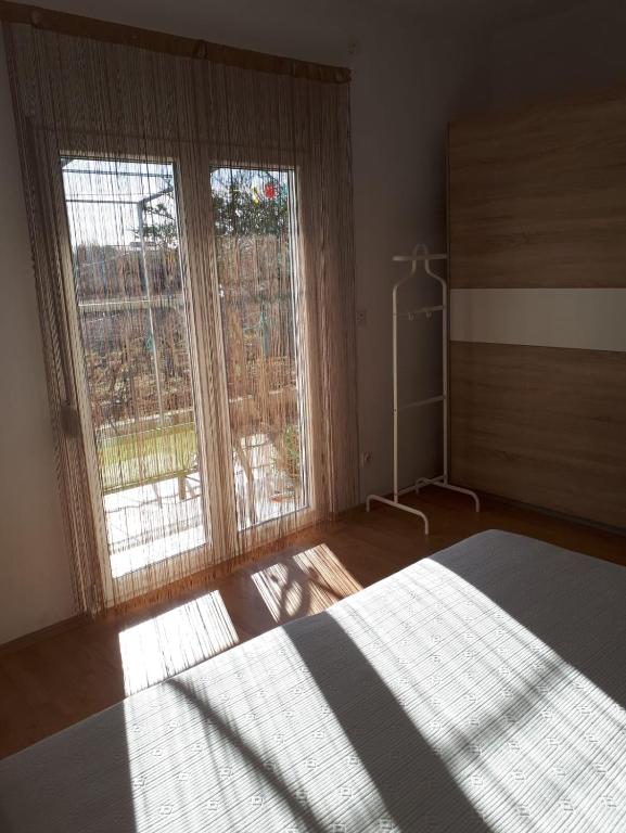 Posteľ alebo postele v izbe v ubytovaní Cozy apartment Josipa