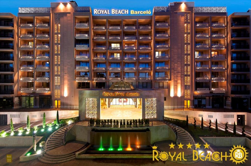 a view of the royal beijing hotel at night at ROYAL BEACH HOTEL apartment in Sunny Beach