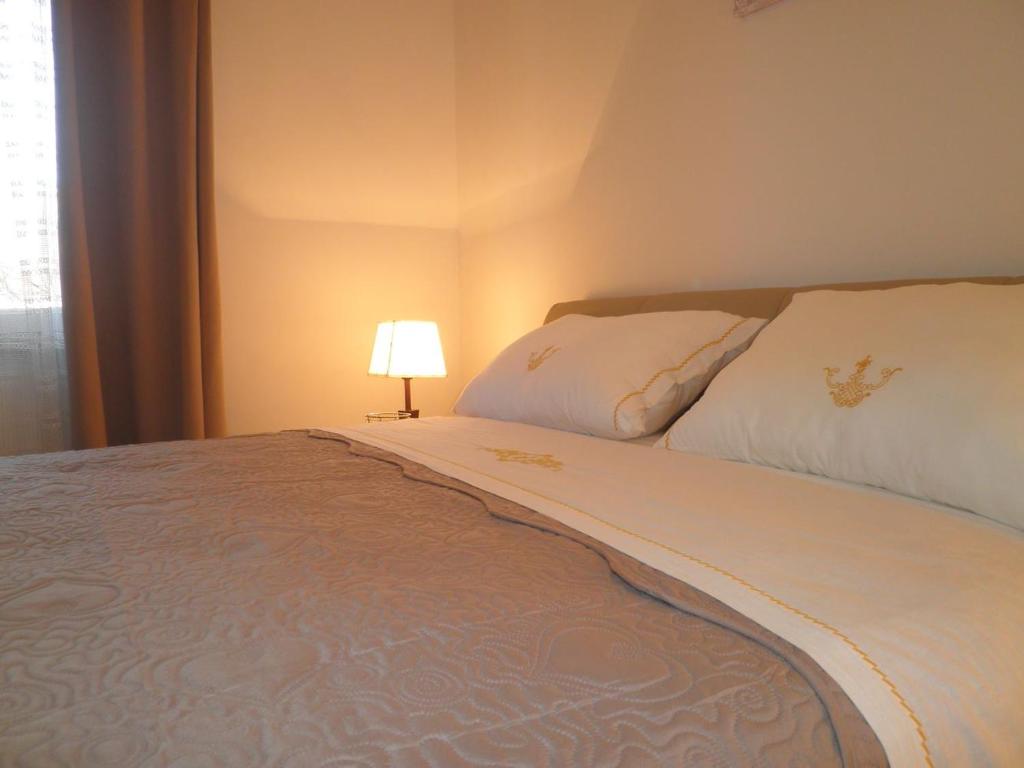 Postel nebo postele na pokoji v ubytování Casa Fiorella Ika-Opatija