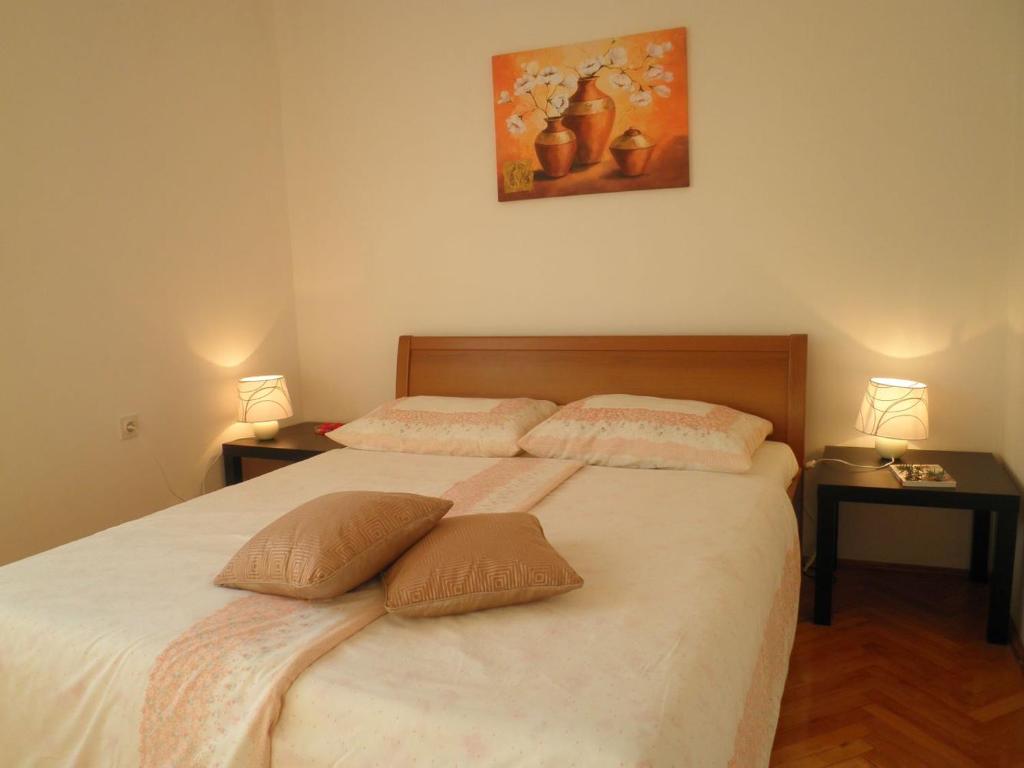 Postel nebo postele na pokoji v ubytování Casa Fiorella Ika-Opatija
