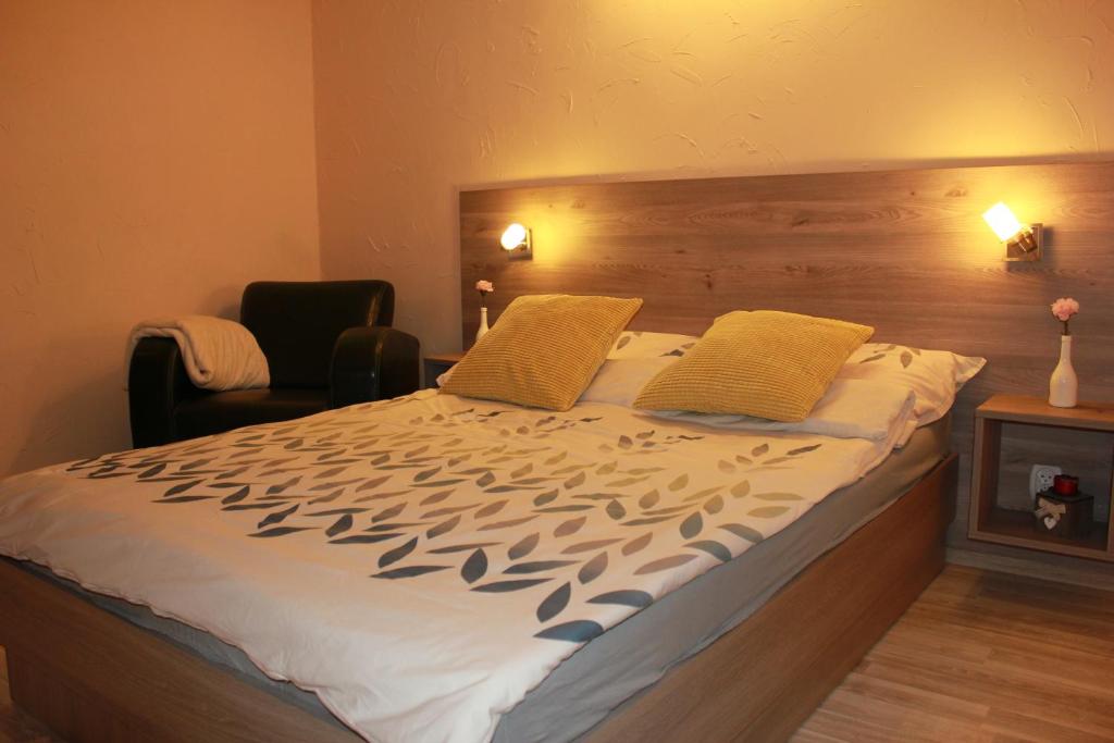 Posteľ alebo postele v izbe v ubytovaní Apartament Izabella