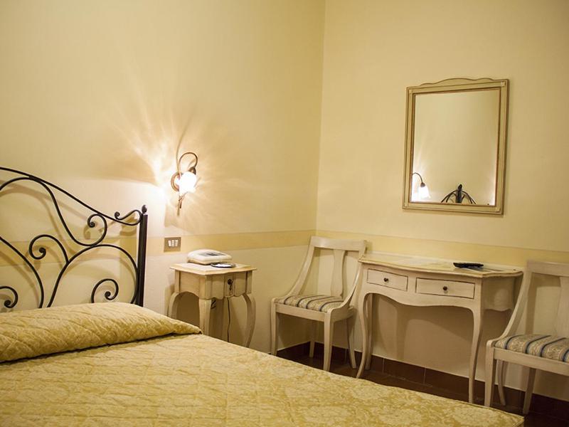 Postel nebo postele na pokoji v ubytování Hotel Garnì Bartabel