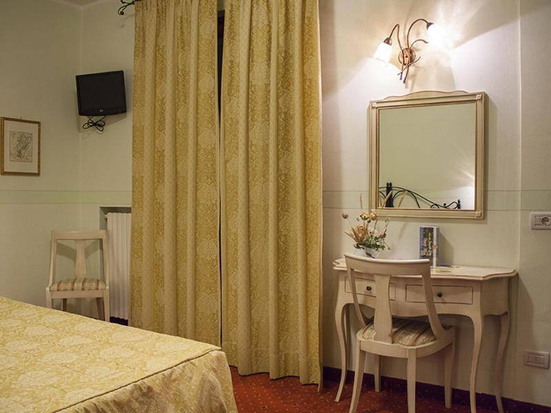 Postel nebo postele na pokoji v ubytování Hotel Garnì Bartabel