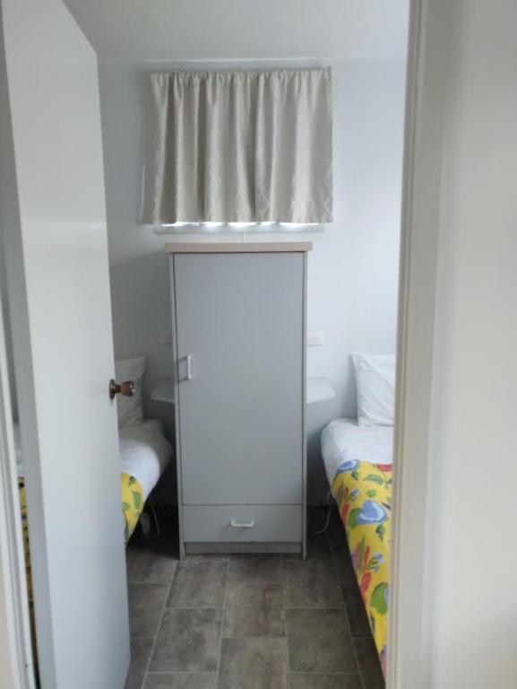 Postel nebo postele na pokoji v ubytování Summers Rest Units
