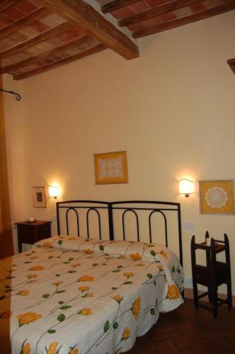 A bed or beds in a room at Il Giardino Segreto