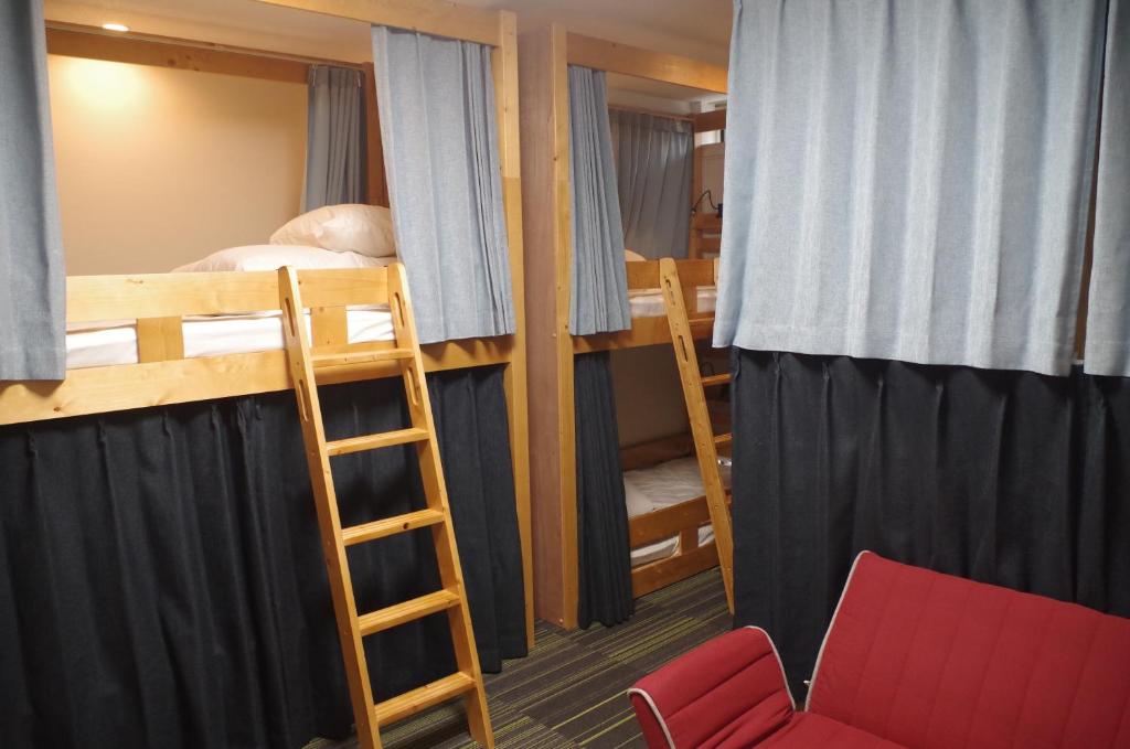 Postel nebo postele na pokoji v ubytování Guesthouse POPTONE