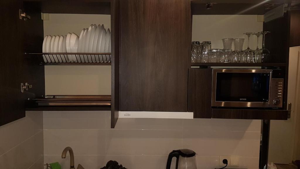 Kuchyň nebo kuchyňský kout v ubytování New Gudauri Loft II studio 553