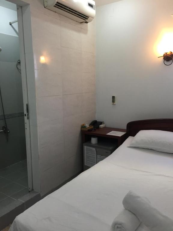 Voodi või voodid majutusasutuse Vy Khanh Guesthouse toas