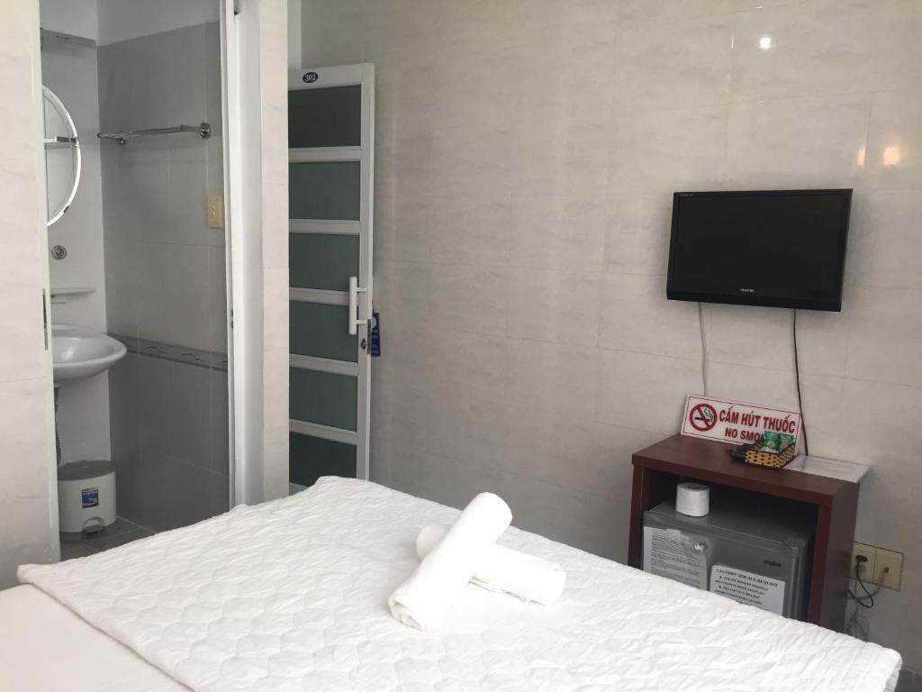 Voodi või voodid majutusasutuse Vy Khanh Guesthouse toas