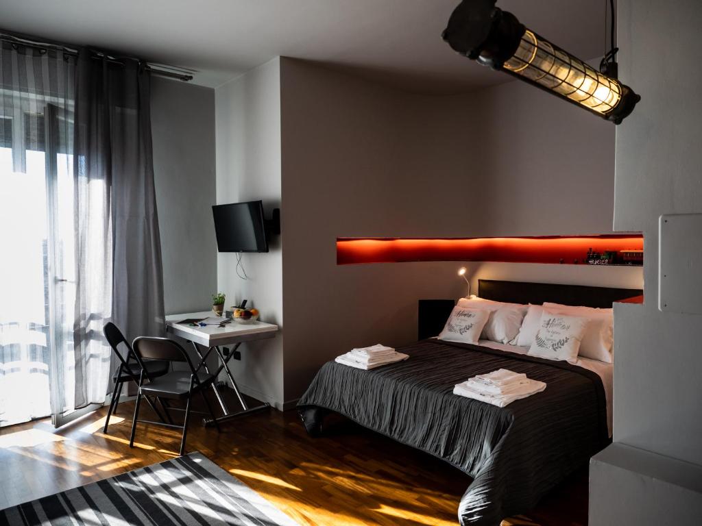 Posteľ alebo postele v izbe v ubytovaní Carlotta Station Suite
