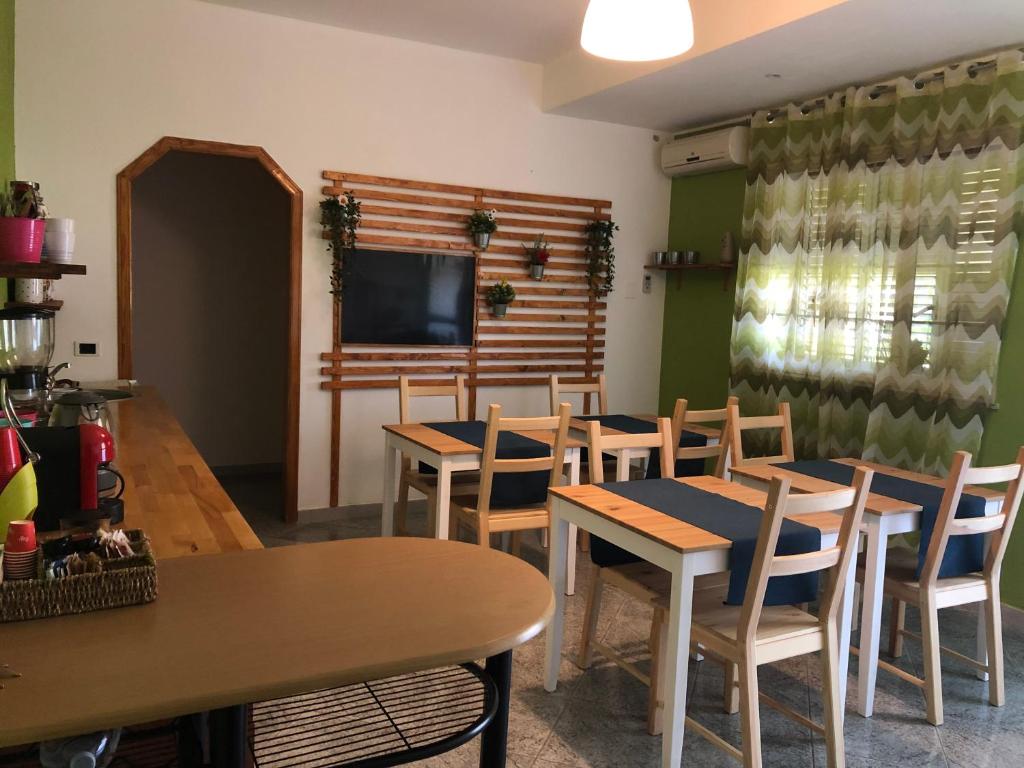Televízia a/alebo spoločenská miestnosť v ubytovaní A Casa di Giù B&B