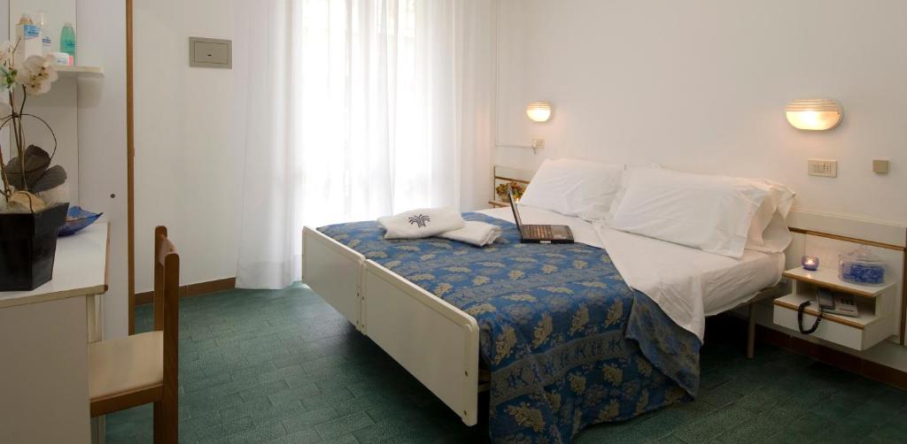 Postel nebo postele na pokoji v ubytování Hotel La Cappuccina