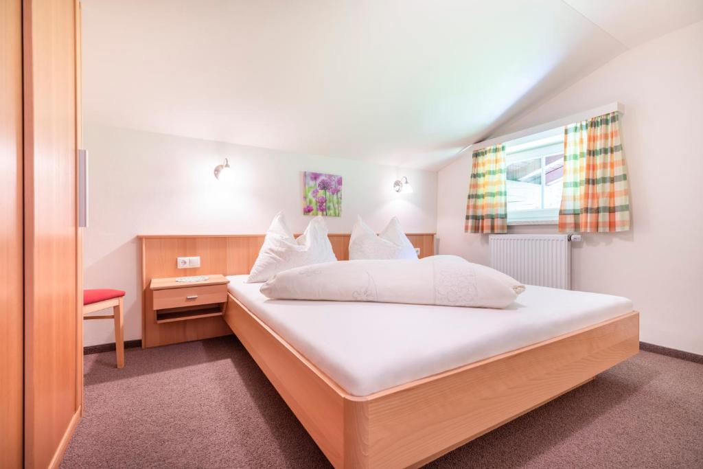 Letto o letti in una camera di Wechslerhof