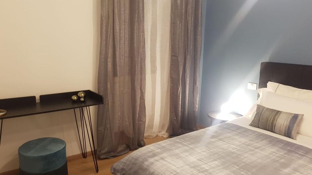 Una cama o camas en una habitación de Hotel Moniga