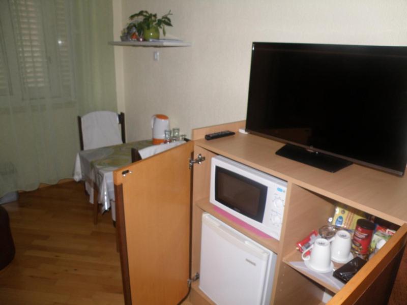 Kuchyň nebo kuchyňský kout v ubytování Rooms Alida