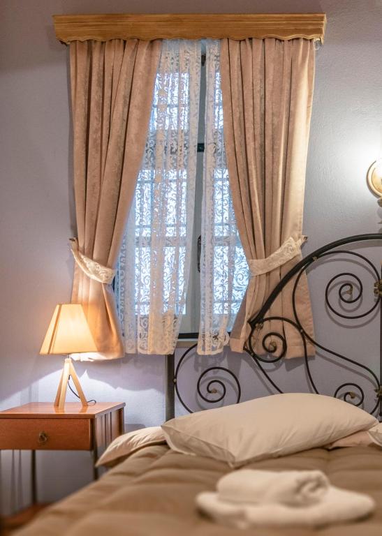 Postel nebo postele na pokoji v ubytování Guesthouse Selini