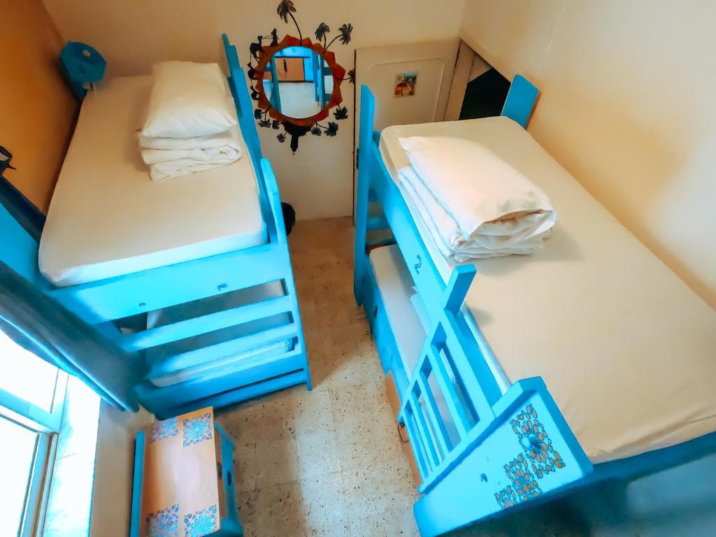 Postel nebo postele na pokoji v ubytování Hostel Malti Budget