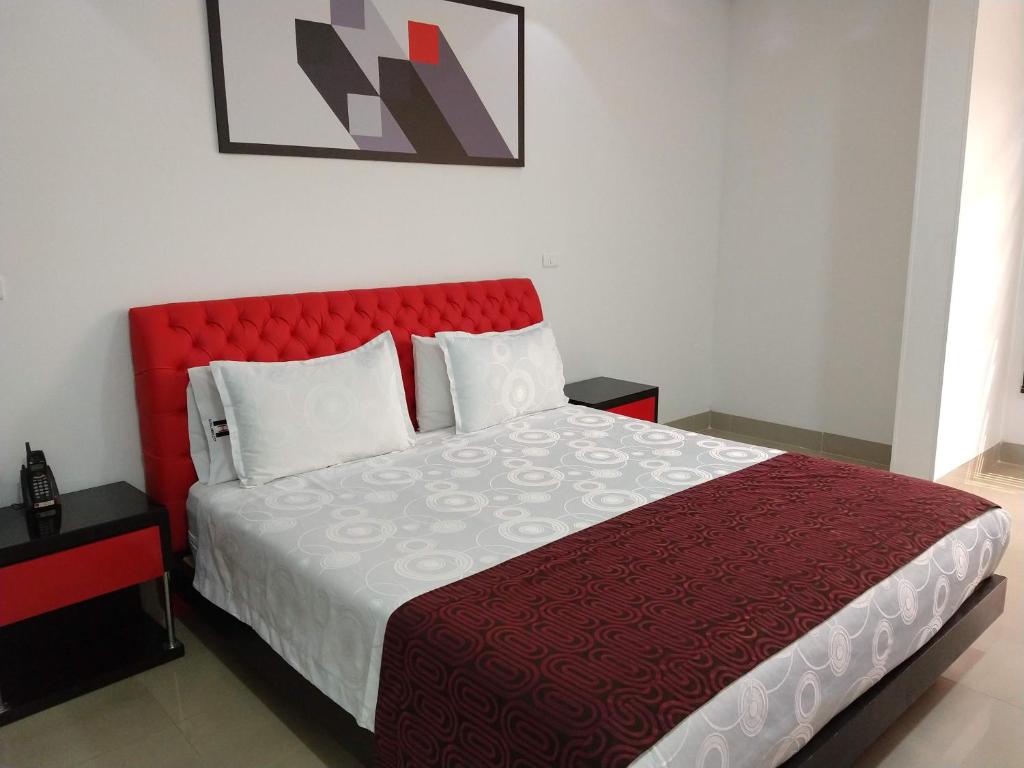 Postel nebo postele na pokoji v ubytování Hotel Merlott 70