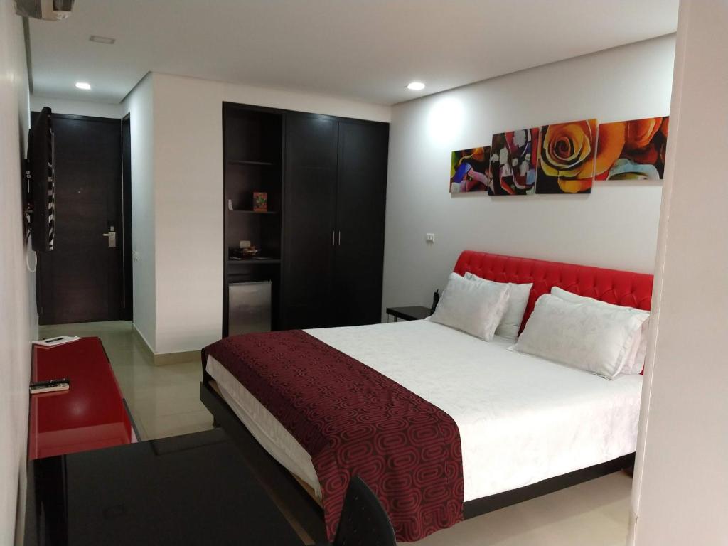 Postel nebo postele na pokoji v ubytování Hotel Merlott 70