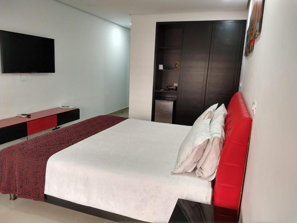 Postel nebo postele na pokoji v ubytování Hotel Merlott 70