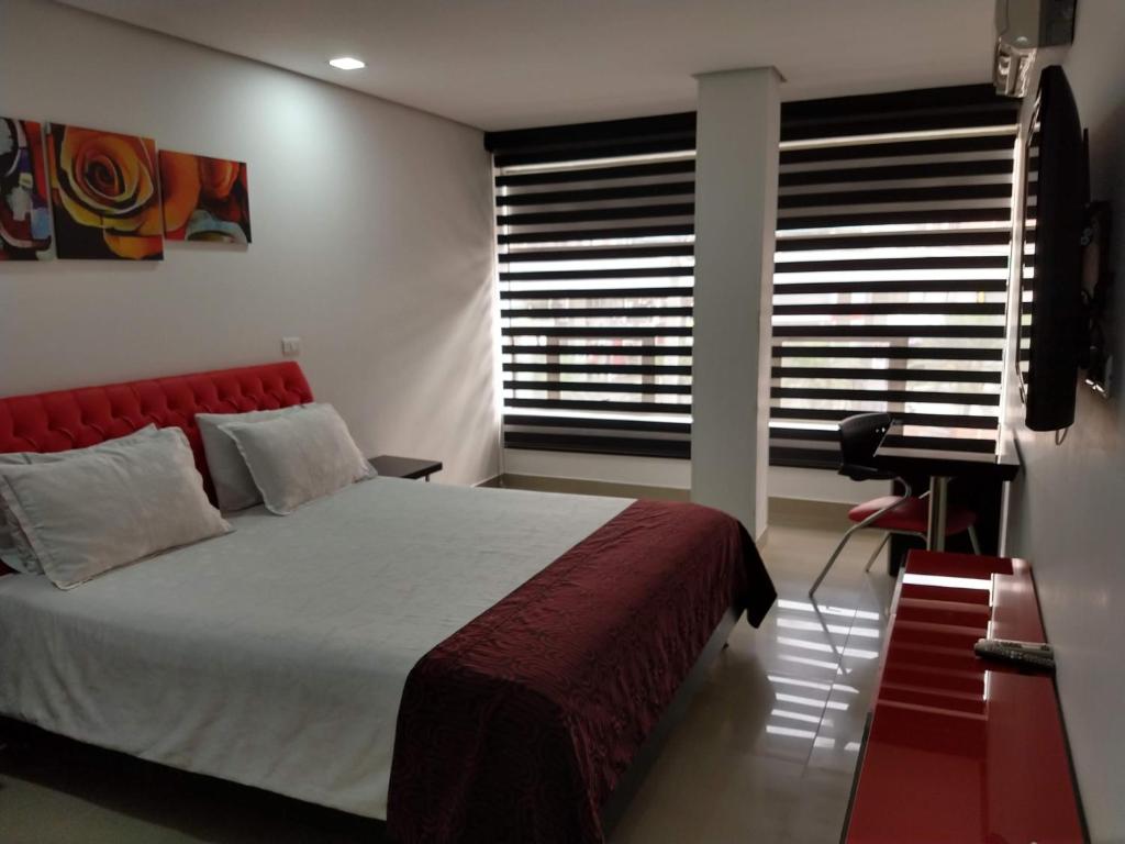 Postel nebo postele na pokoji v ubytování Hotel Merlott 70