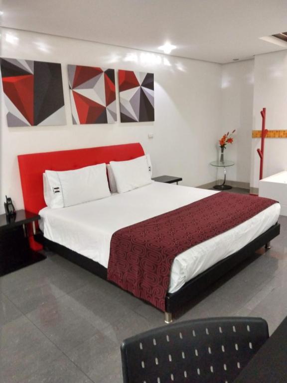 Postel nebo postele na pokoji v ubytování Hotel Merlott 70