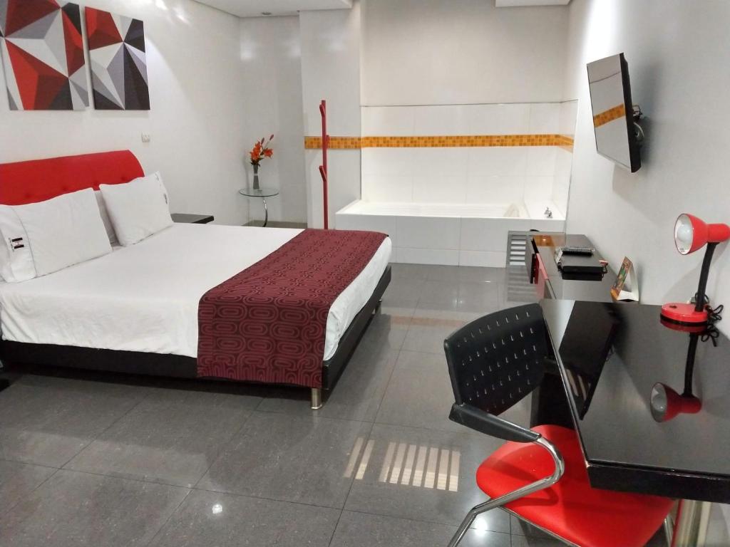 Postel nebo postele na pokoji v ubytování Hotel Merlott 70