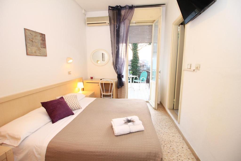 Postel nebo postele na pokoji v ubytování Hotel Verde Luna