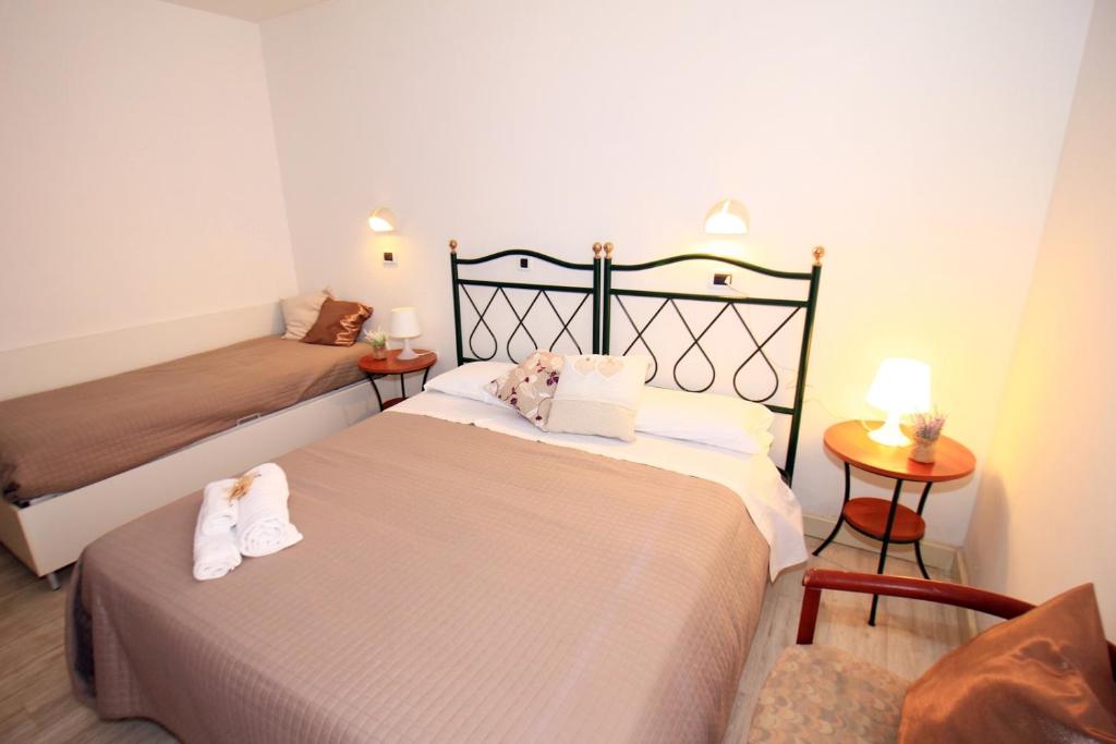 Postel nebo postele na pokoji v ubytování Hotel Verde Luna