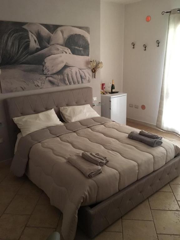 Posteľ alebo postele v izbe v ubytovaní Suite Margarita
