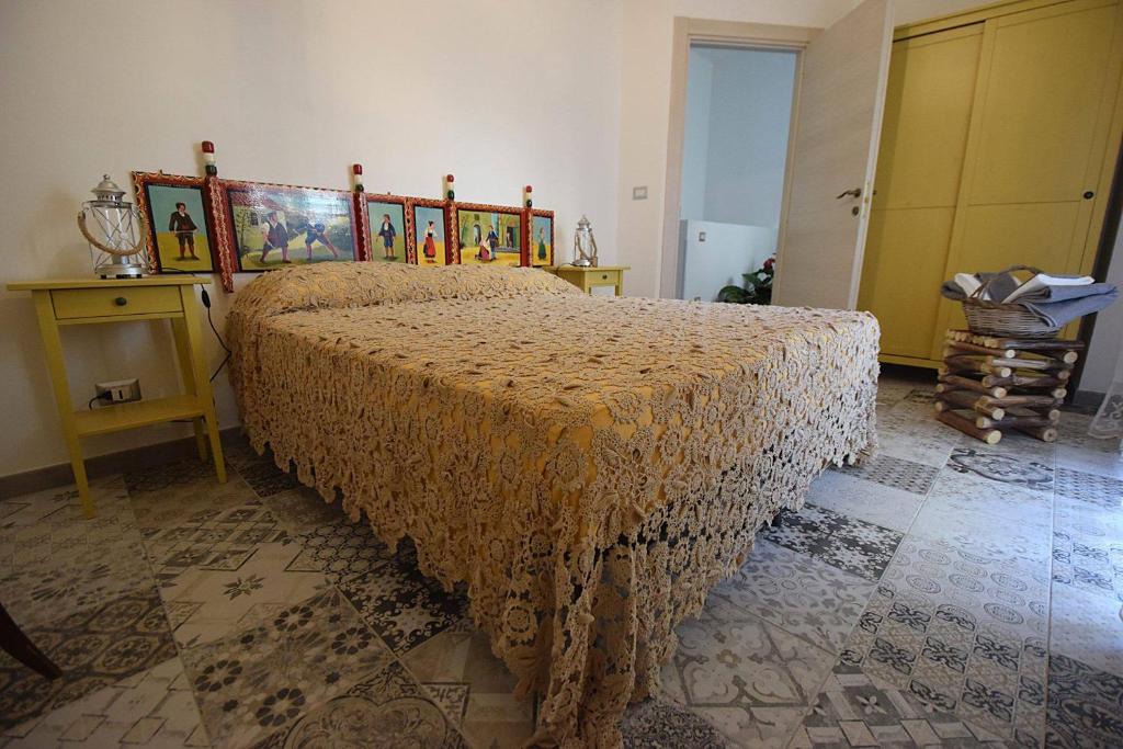 Posteľ alebo postele v izbe v ubytovaní Zù Mariu B&B
