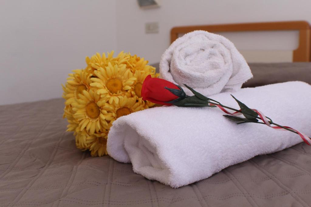 Postel nebo postele na pokoji v ubytování Hotel Caesar